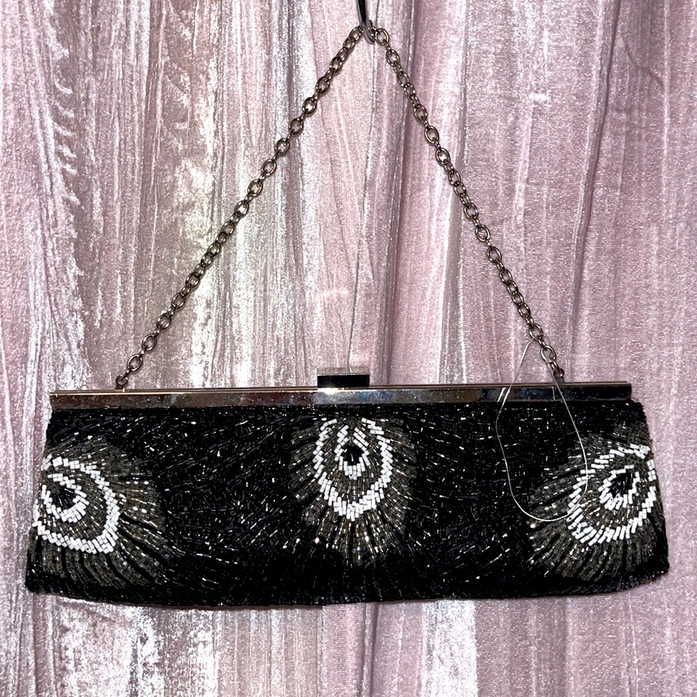 Peacock clutch